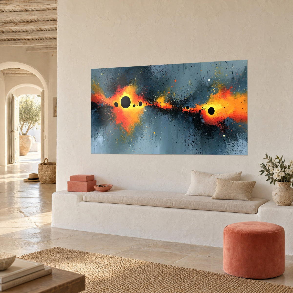 Wall art stellar collision with reddish-orange bursts and black splashes on grey-blue, whitewashed wall, alcove bench