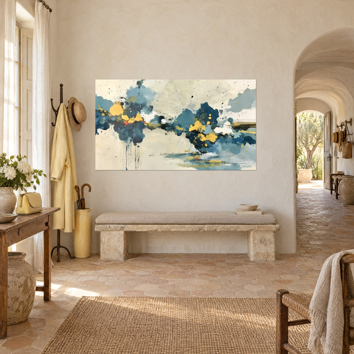 Wall art of a calm storm in petrol blue and mustard yellow strokes on cream background, facing an arch, stone bench and a Provençal farmhouse