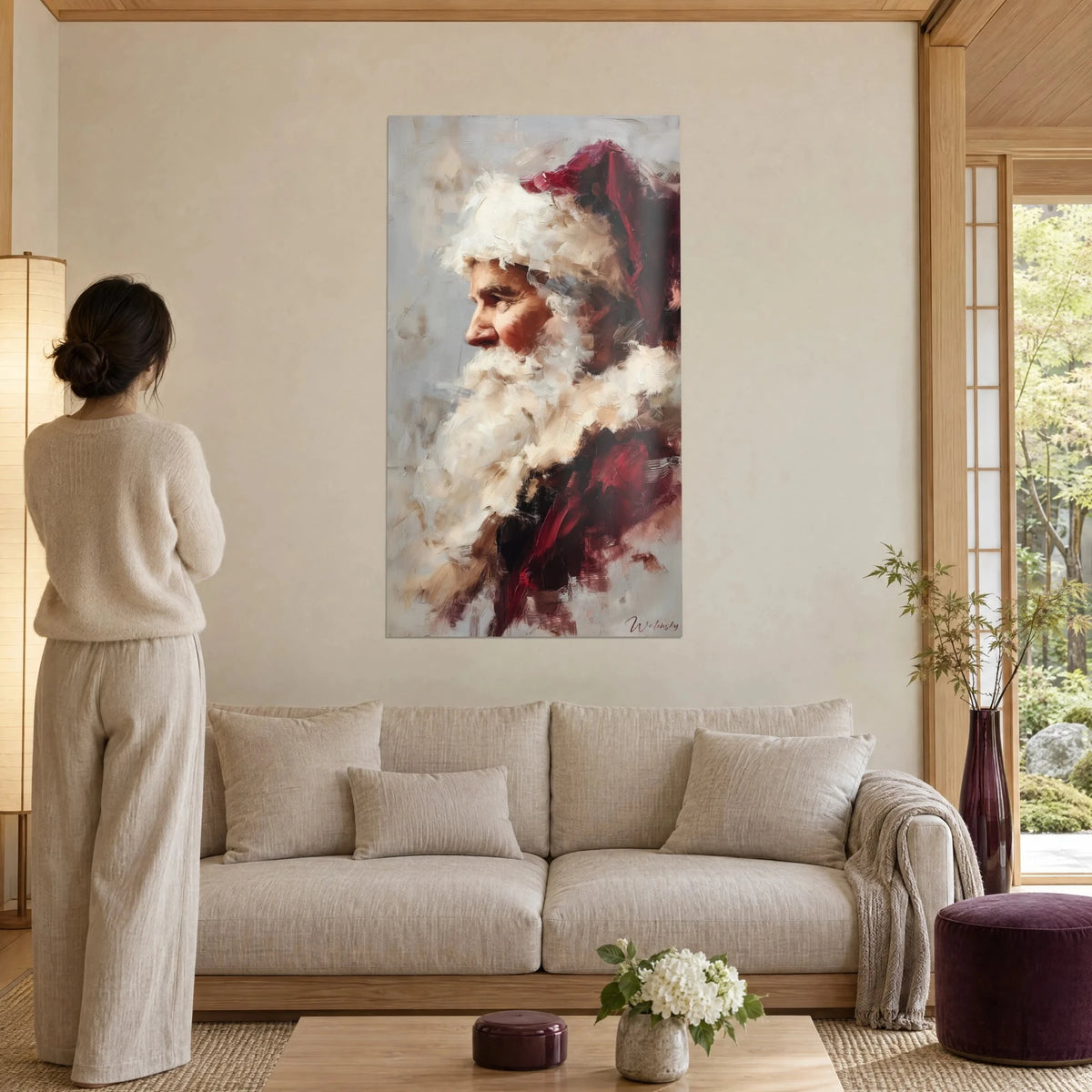Wall art Santa Claus in profile with a thick white beard, burgundy hat, pearl grey background, above a sofa in a bright living room