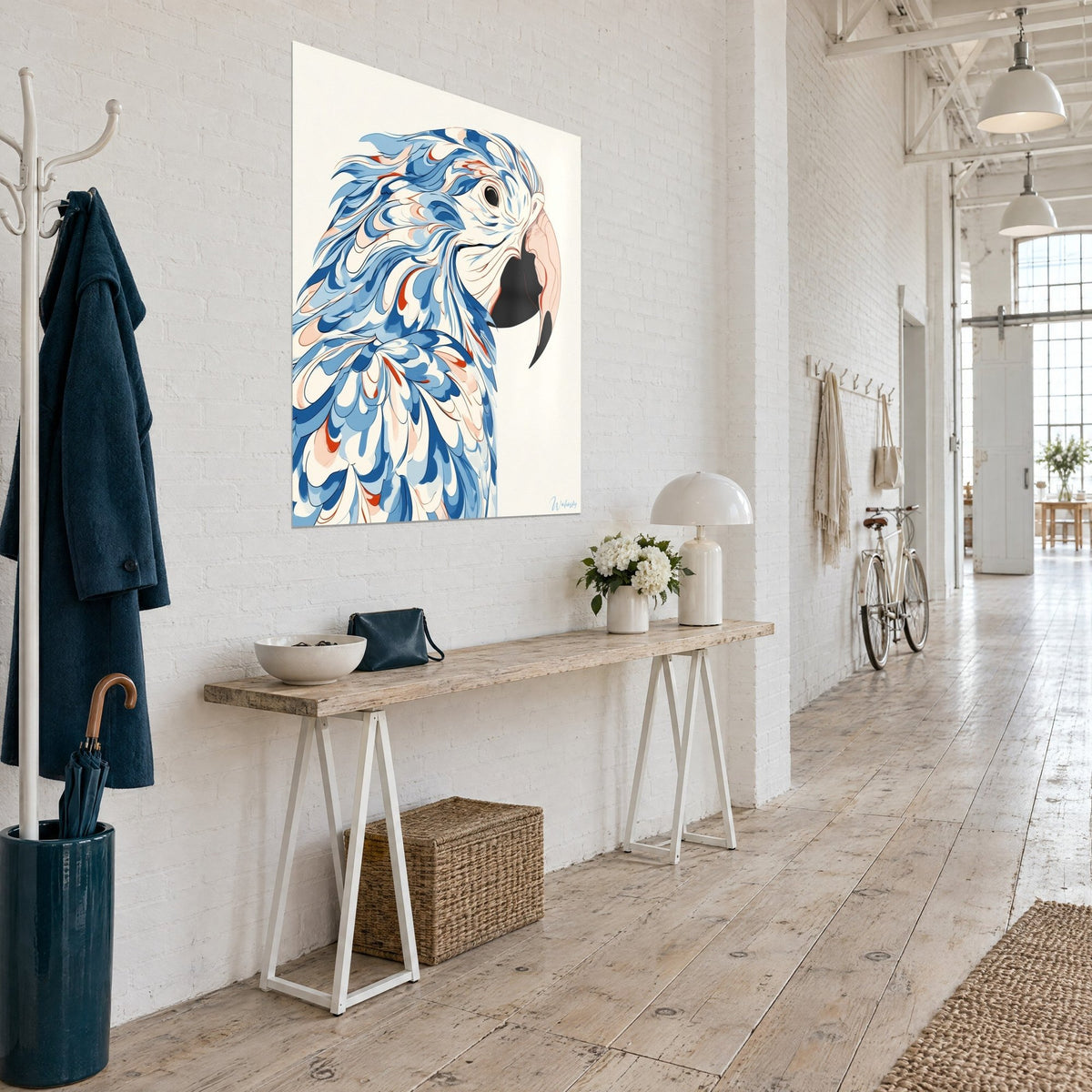Wall art profile view of a macaw, cobalt blue and white scale-like plumage, peach beak, hung in an artist loft hallway