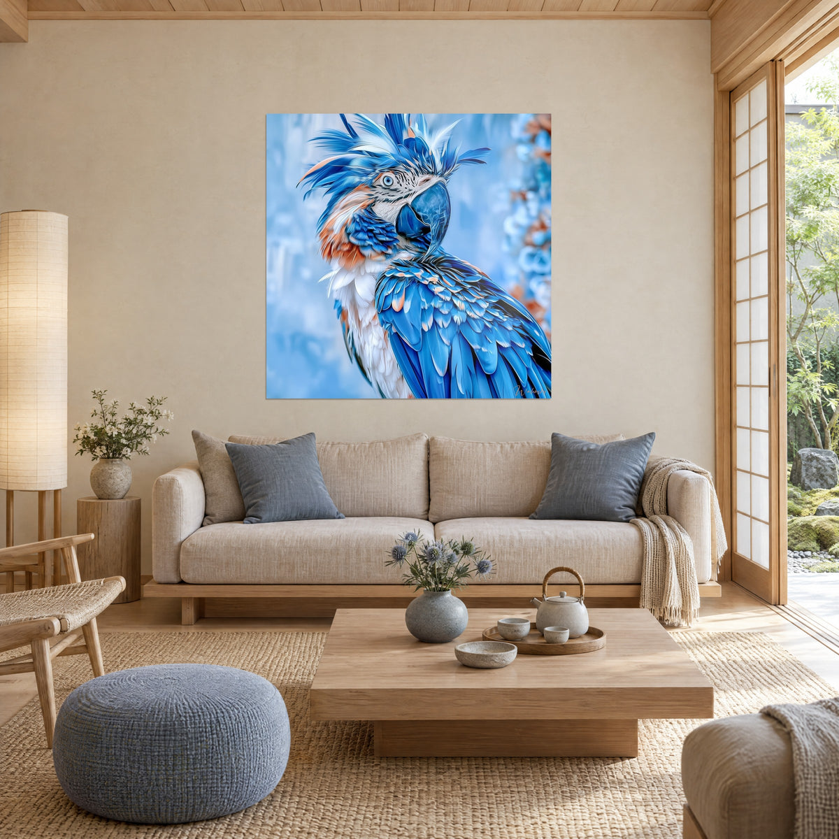 Wall art of a blue parrot with a tousled crest, cobalt feathers with orange highlights, above a sofa in a bright living room