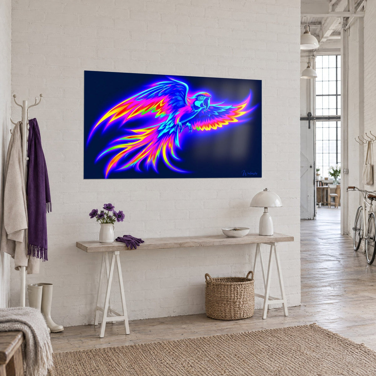 Wall art blazing parrot in full flight, cyan and fiery orange plumage on a navy background, hung above a light wood entryway console