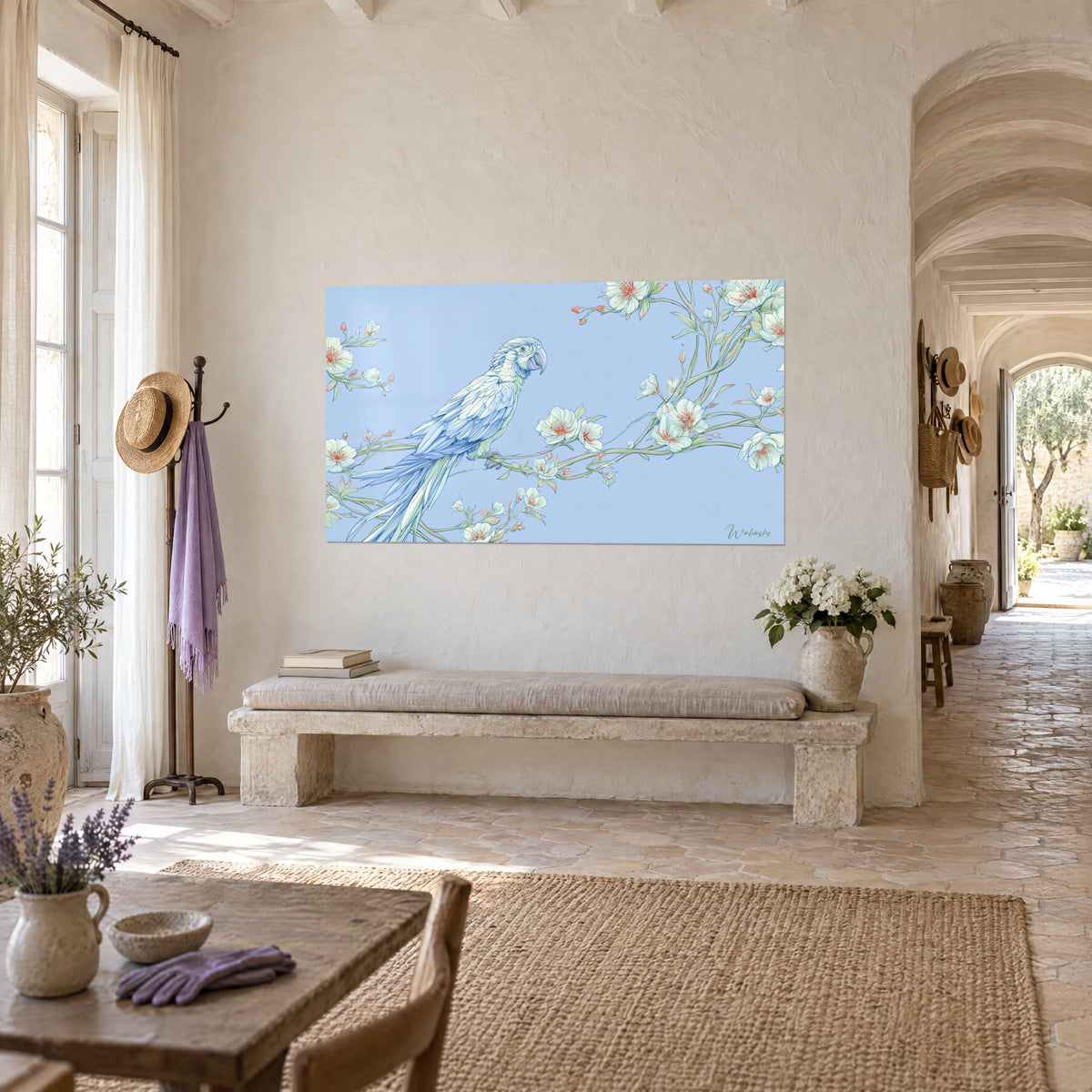 Wall art of a macaw with sky blue and sea green feathers, flowering branch on a lavender background, hung above a stone bench