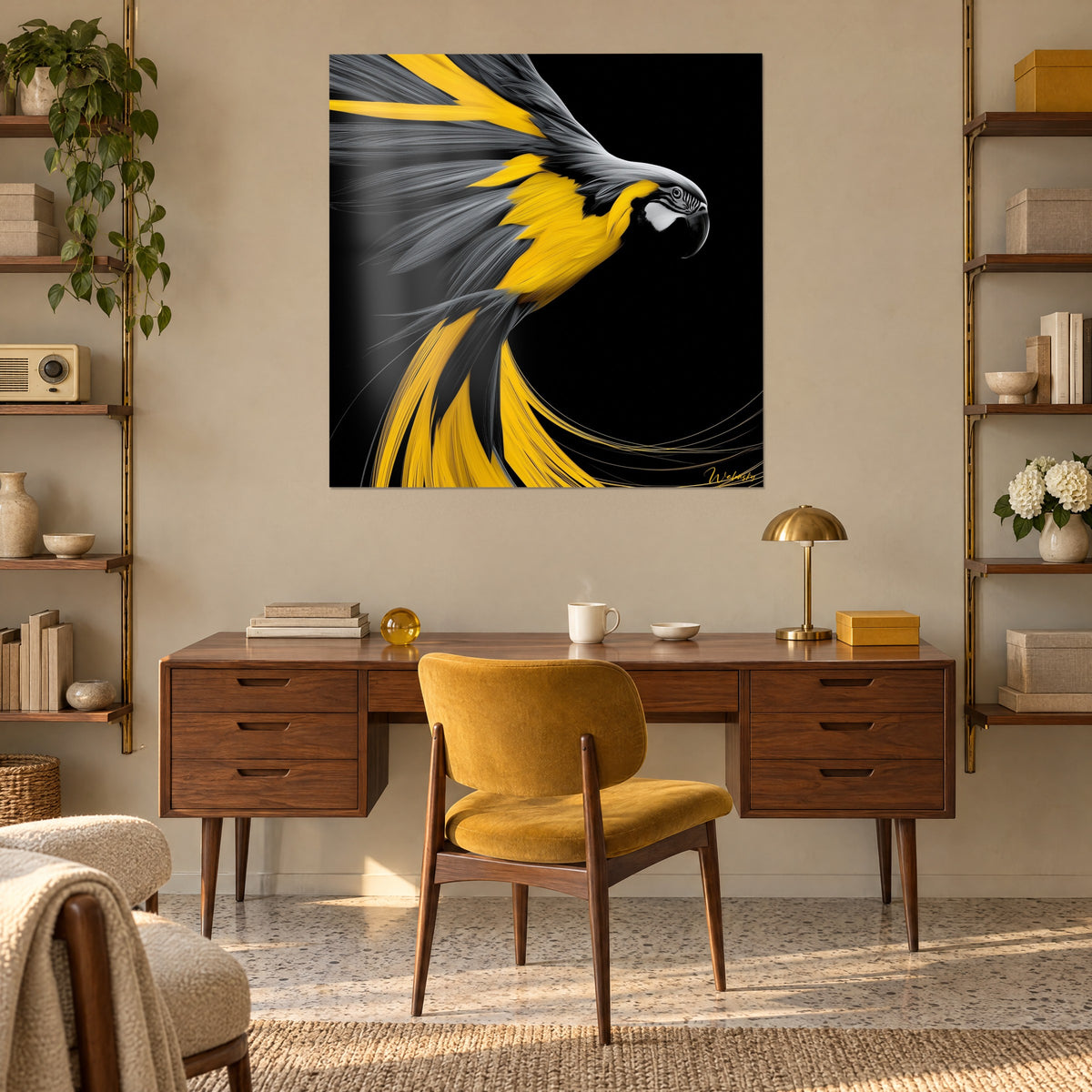 Wall art of a bird with long yellow and grey tail feathers on black ground, hung above a wooden desk and a mustard armchair