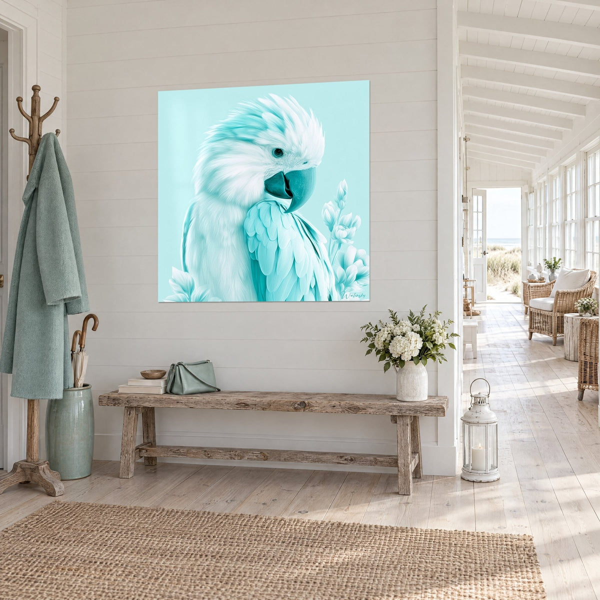 Wall art cockatoo with white and mint feathers, tilted head, glacier blue background, in a seaside house