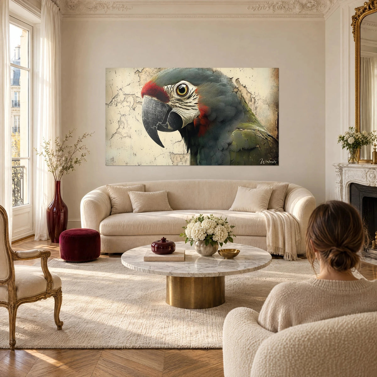 Wall art grey parakeet with red forehead, black beak and green-ringed eye, above a sofa in a bright living room