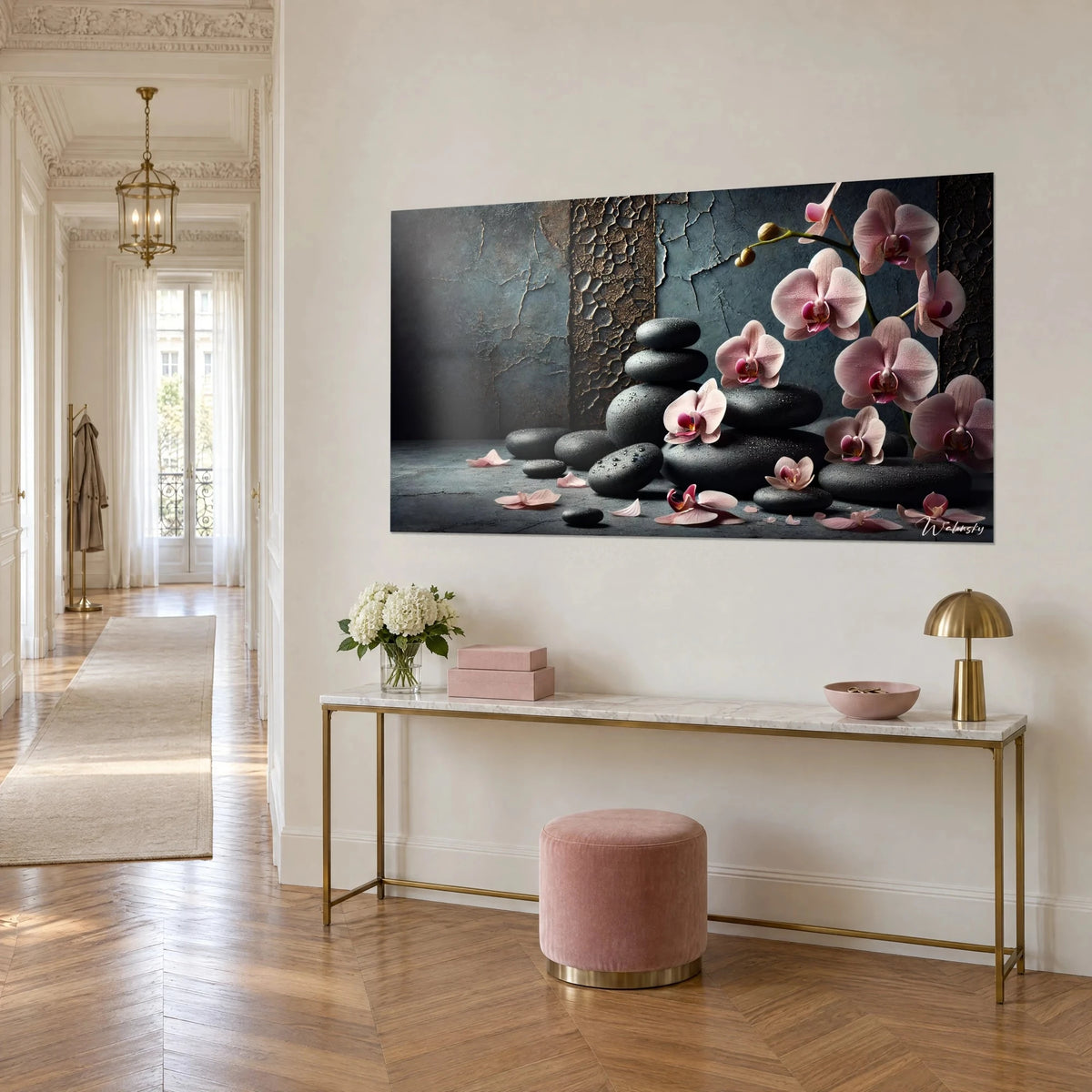 Quadro orchidee phalaenopsis rosa cipria e pietre di basalto impilate, sfondo di cemento screpolato, consolle dorata di tre quarti