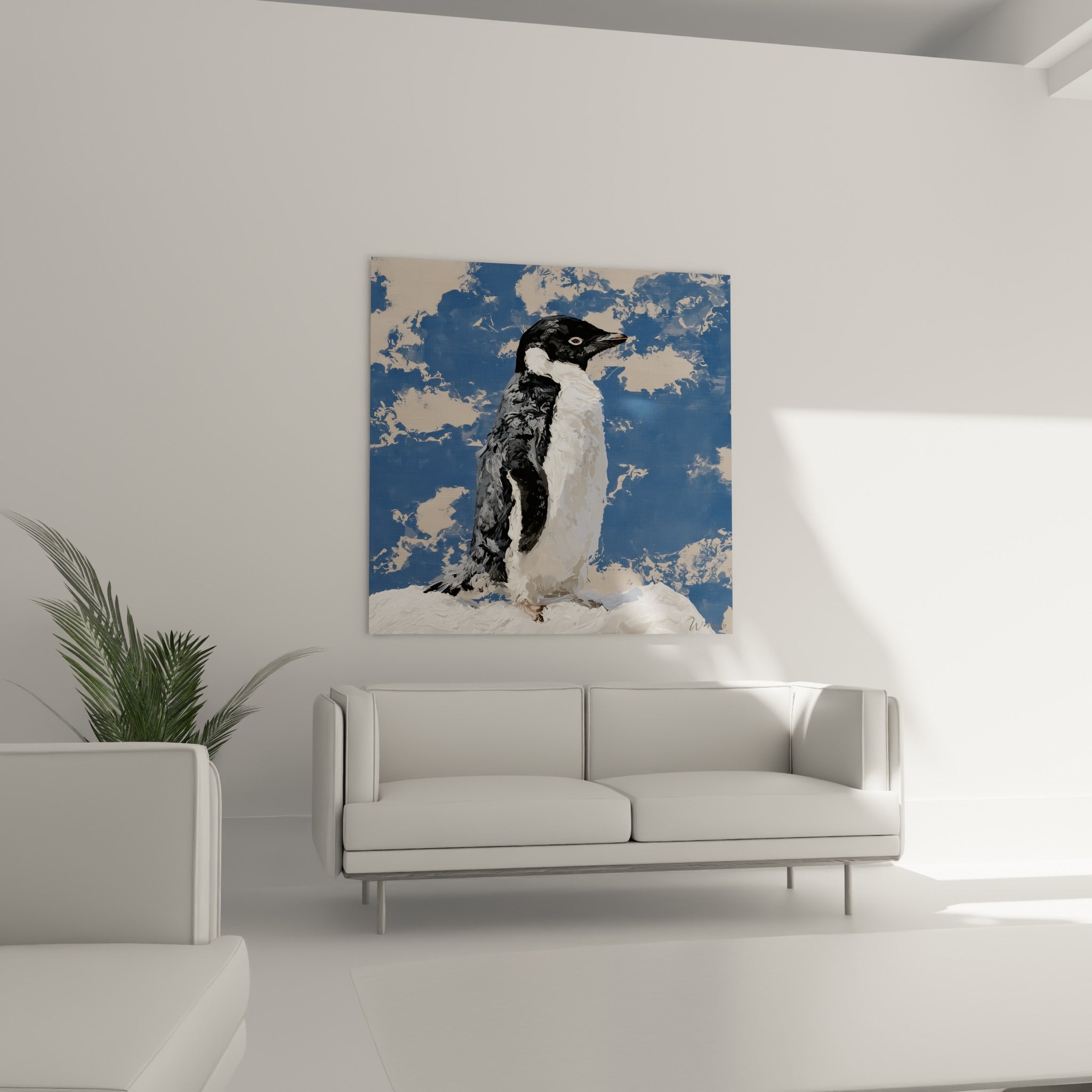 Pingouin debout sur la banquise blanche, tons bleu marine et écru, au-dessus d'un canapé dans un salon lumineux