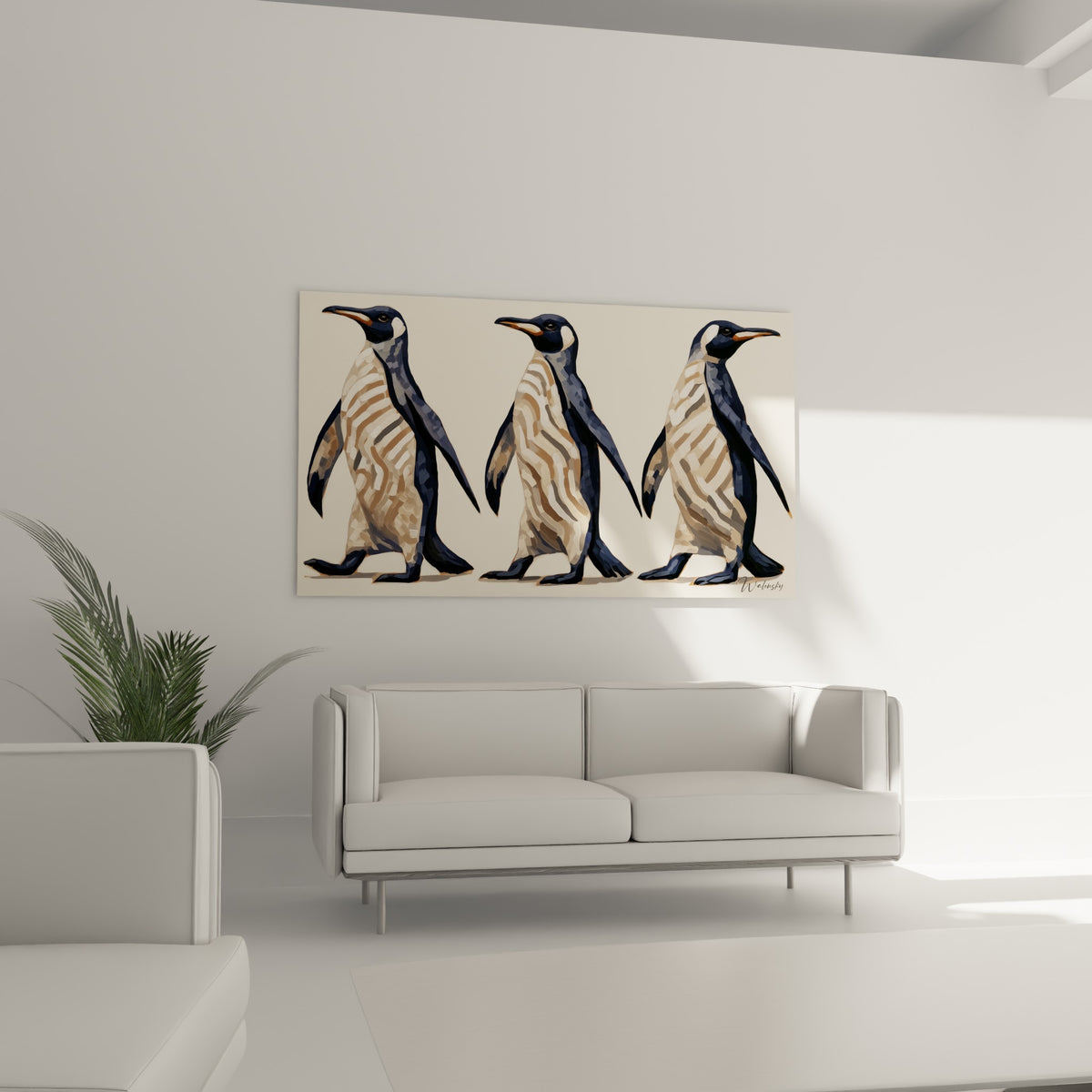 Silhouettes de pingouins bleu marine et ocre disposées au-dessus d'un canapé dans un salon lumineux