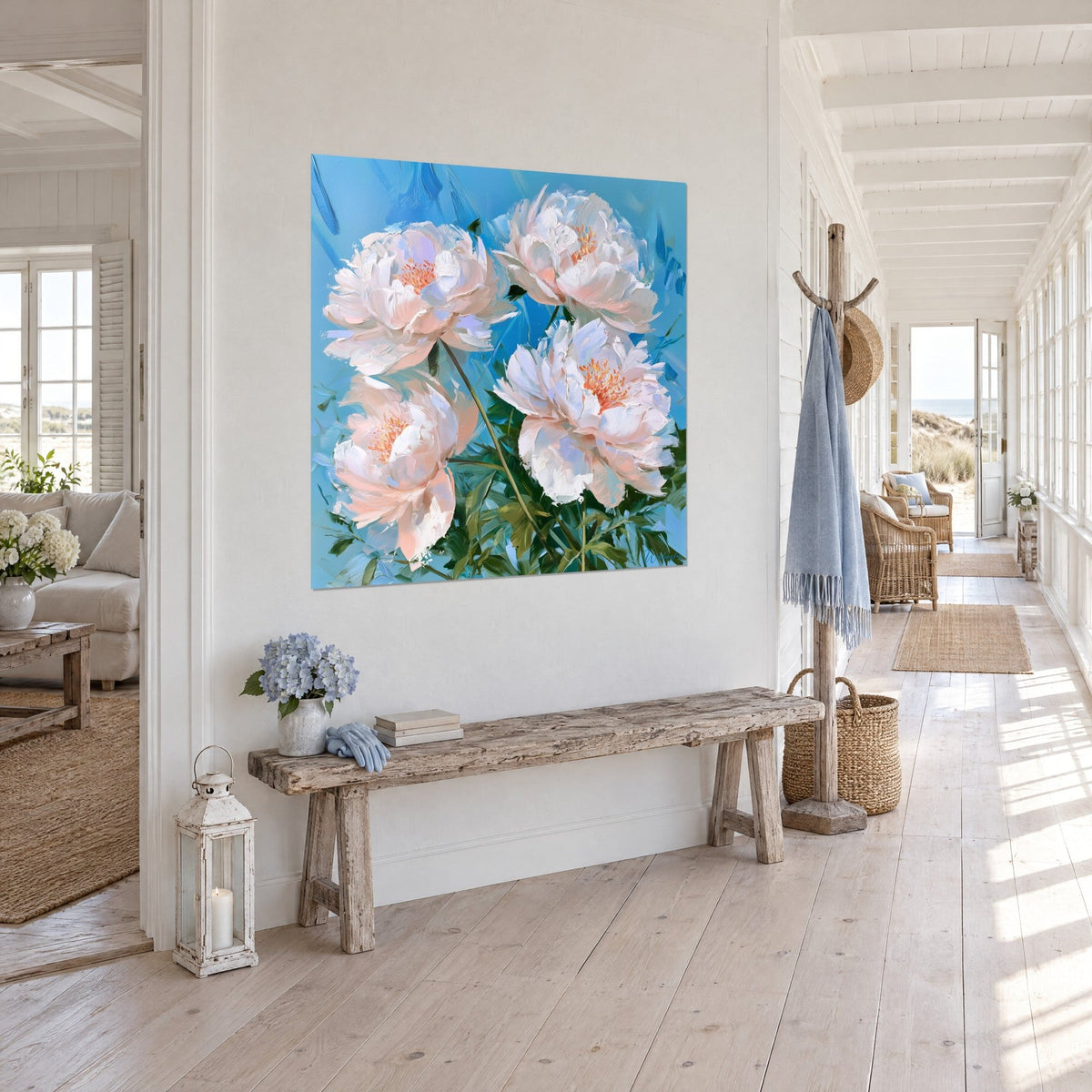Wall art bouquet of four pink flowers in thick brushstrokes, dark green foliage, sky blue, on a coastal hallway wall