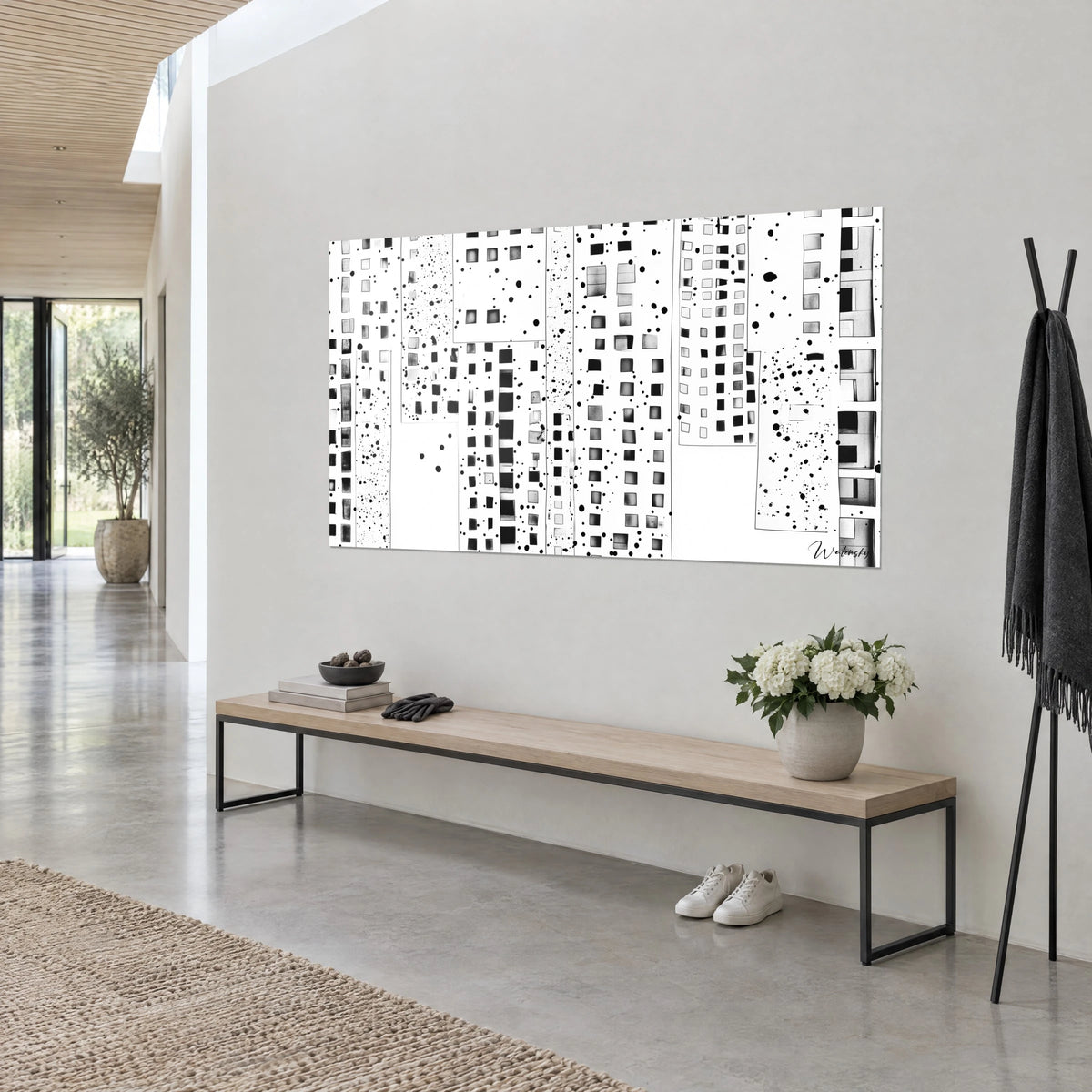 Schilderij van een mozaïek van zwarte en grijze vierkante ramen, bespat met inktdruppels op een witte achtergrond, driekwart zicht op een lichtgrijze muur