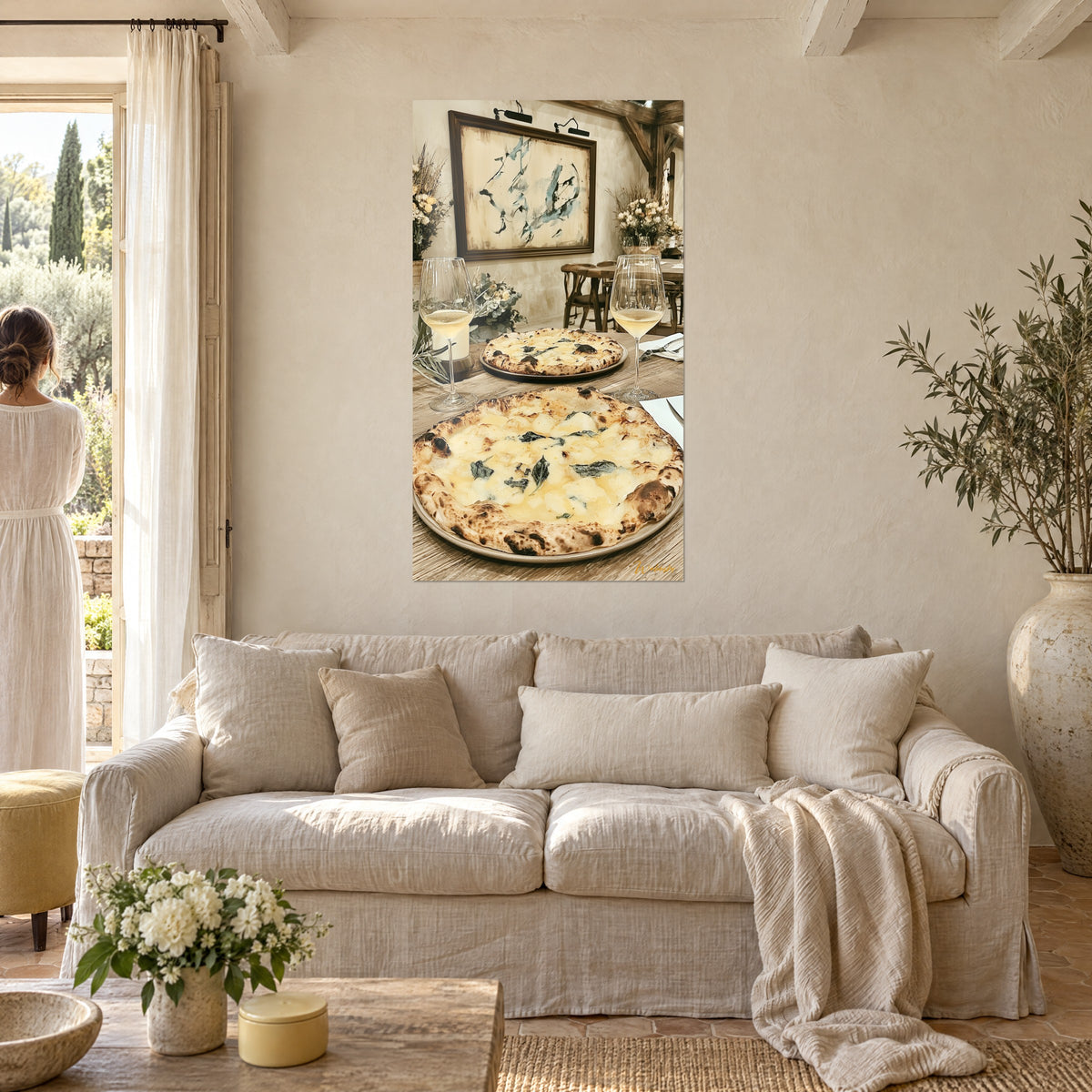 Wall art white pizza with golden crust and basil leaves, cream and blue tones, above a sofa in a bright living room
