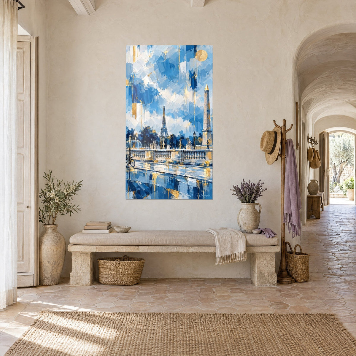 Wall art: Filigree Eiffel Tower between cobalt blue sky and ivory clouds, with gold drips, hung in a Provençal farmhouse hallway