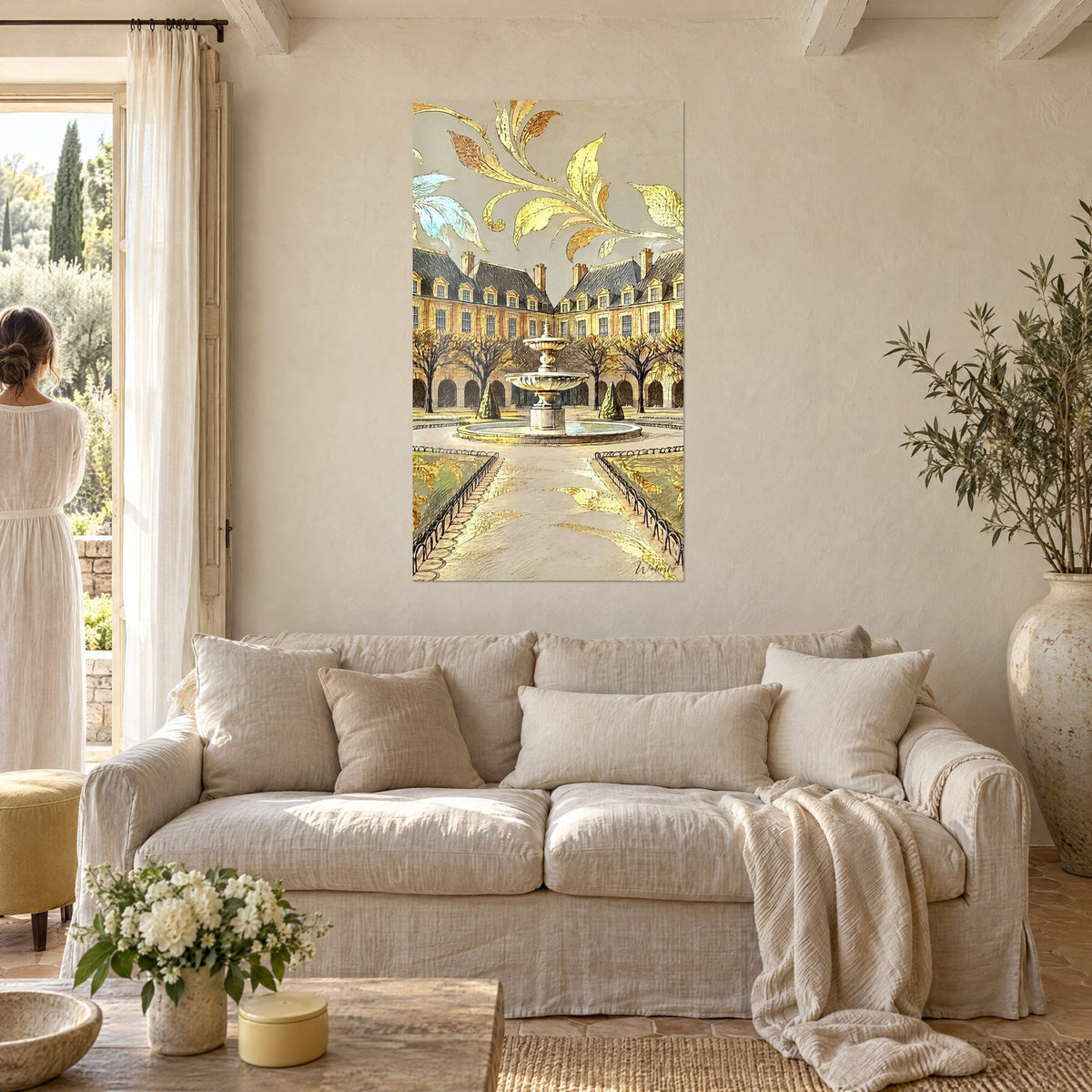Wall art ivory stone basin fountain, bare trees and gold leaves, above a sofa in a bright living room