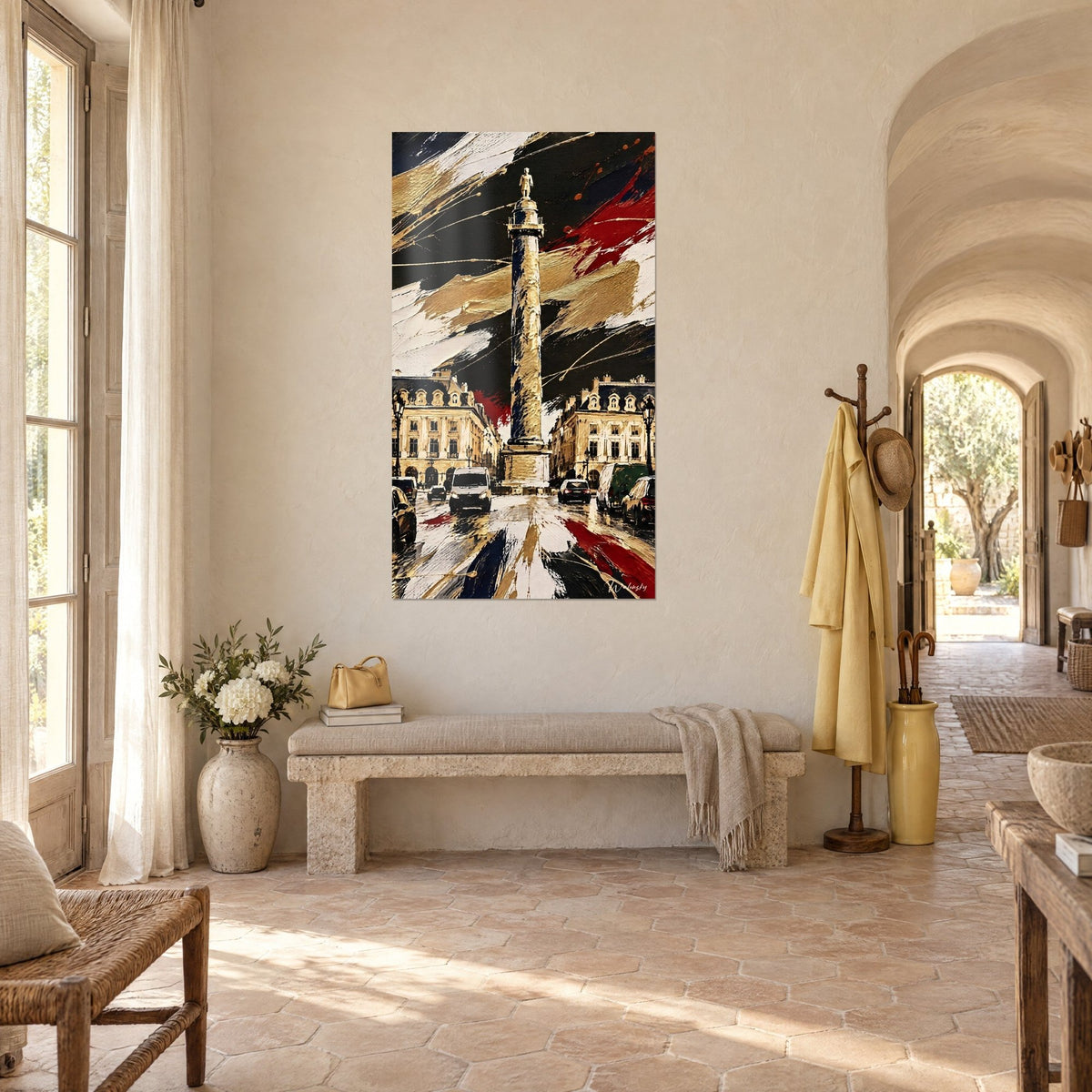 Quadro obelisco napoleonico dorato, fondo nero striato di rosso carminio e avorio, appeso in un corridoio a volte di un mas