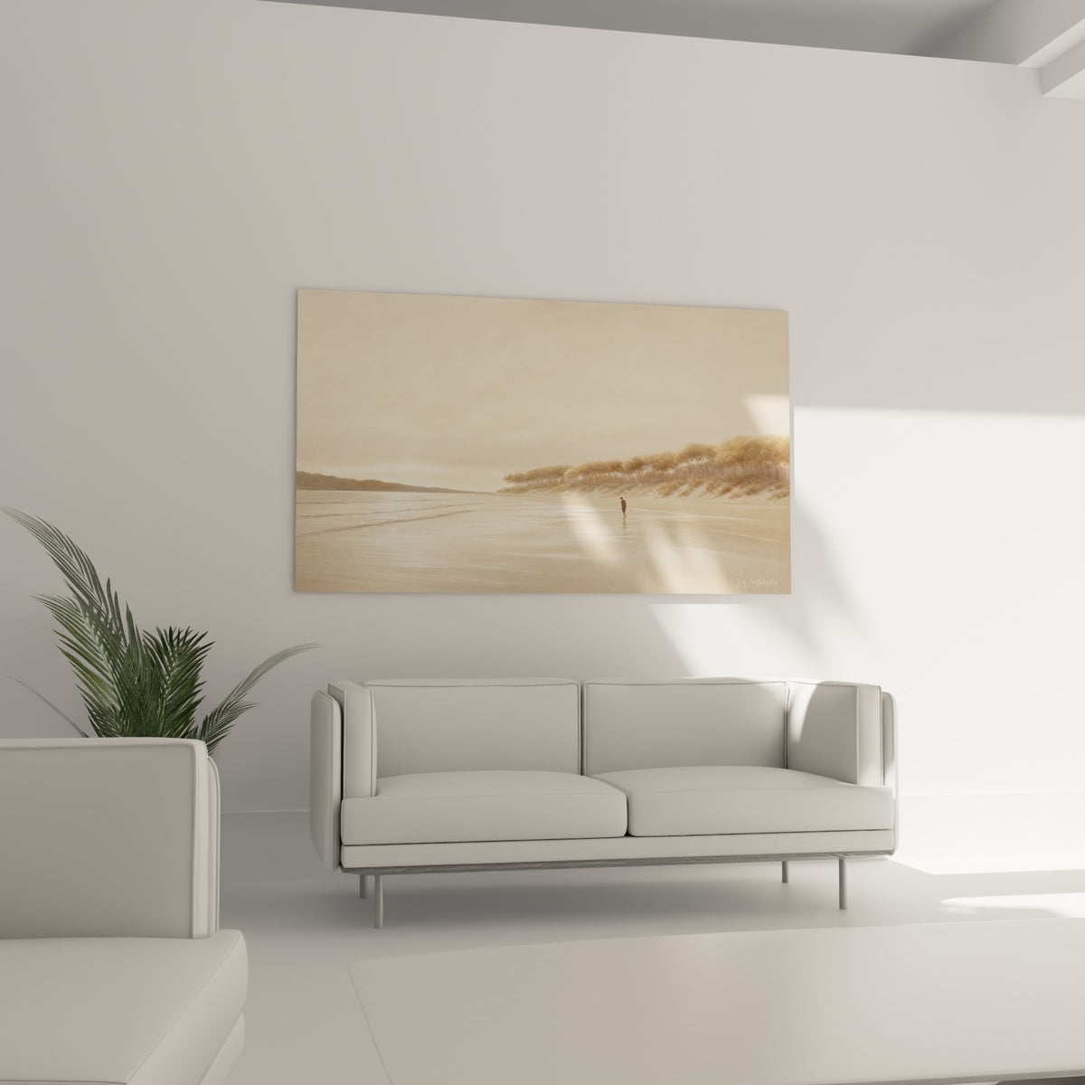Dunes sablonneuses et silhouette lointaine au-dessus d'un canapé dans un salon lumineux