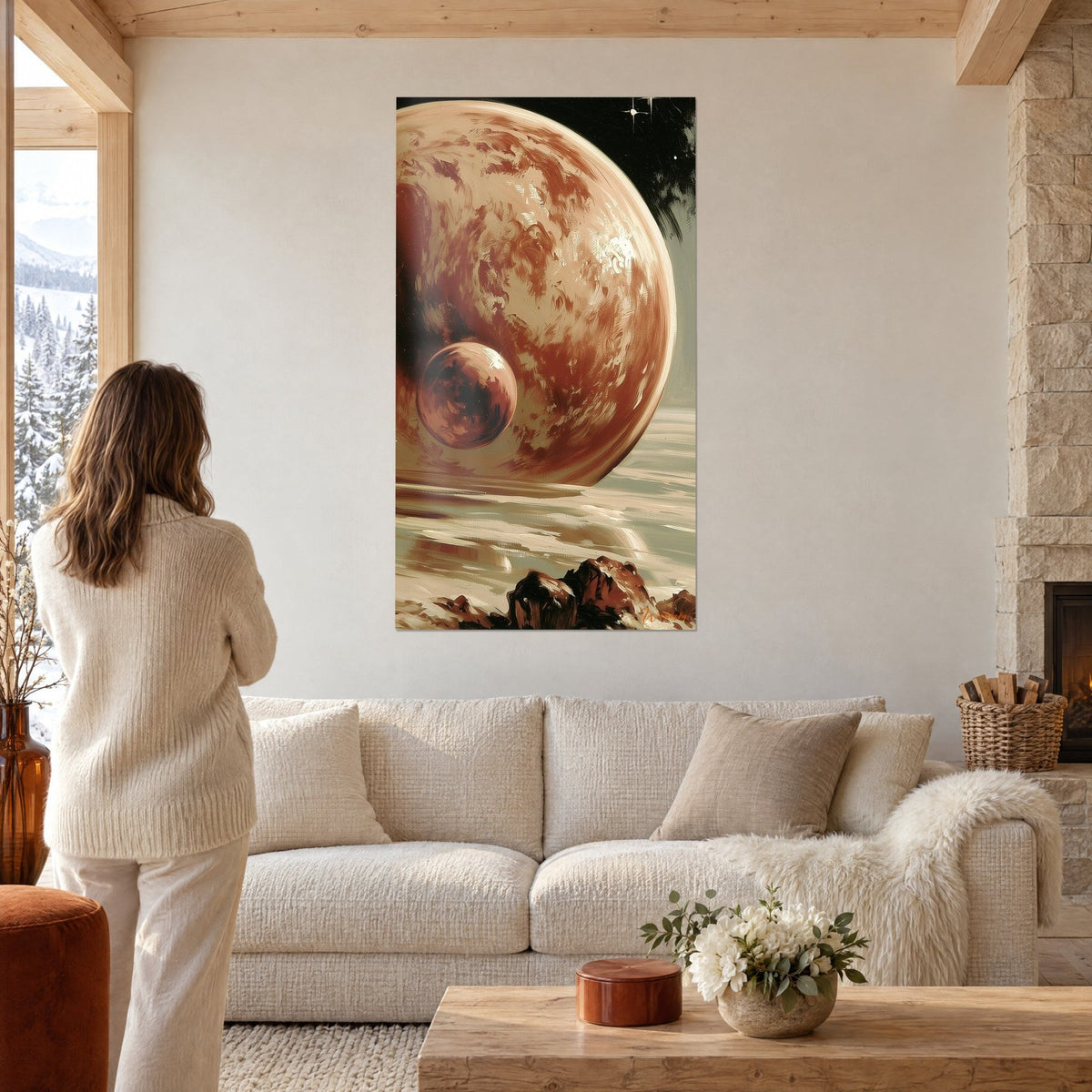 Wall art of a rust-streaked copper planet with a small twin moon, beige and brown, above a sofa in a bright living room