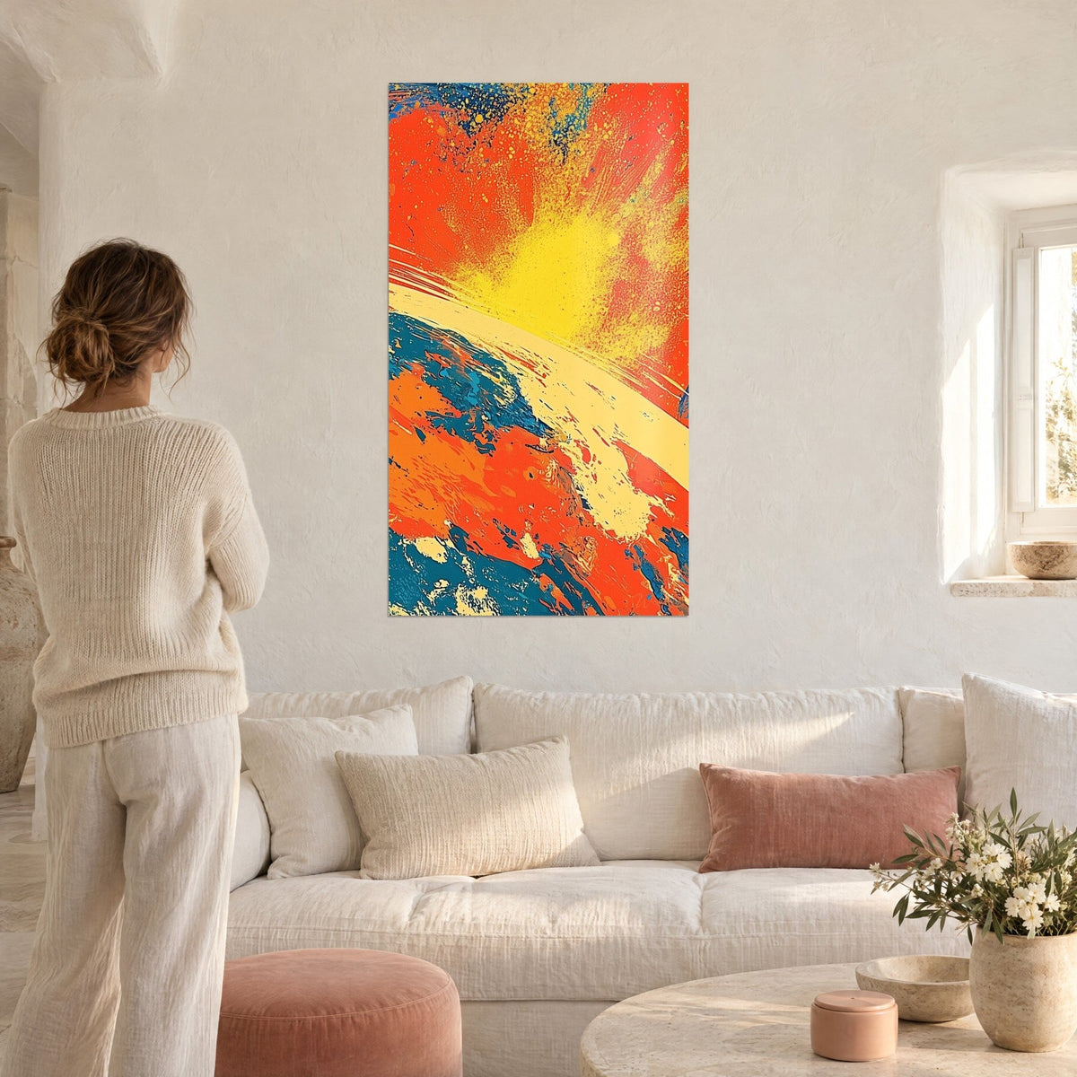 Wall art dazzling solar eclipse, lemon-yellow halo on vivid orange and petrol-blue background, above a sofa in a bright living room