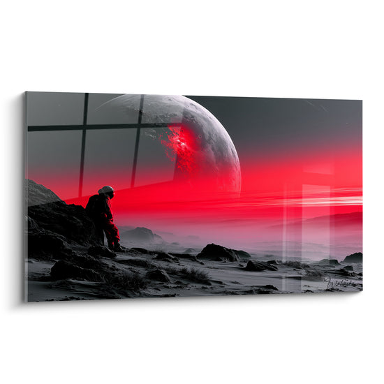 Astronaute assis face à une planète rouge et grise sur un sol rocheux anthracite