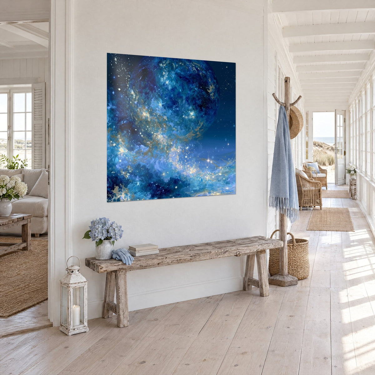 Wall art celestial sphere dusted with gold powder on indigo night, three-quarter view in a bright hallway