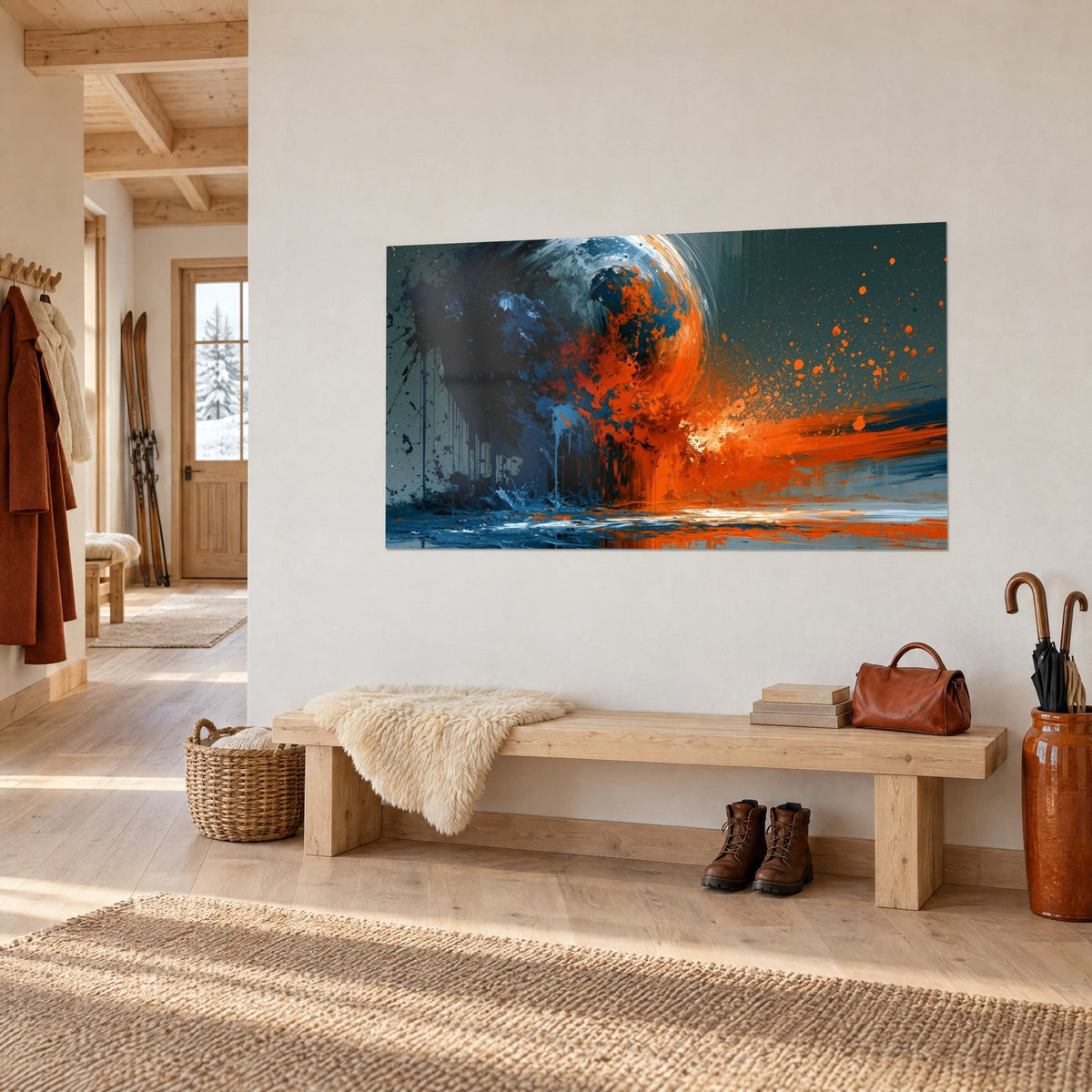 Cuadro planeta de tinta negra y azul, estallido de pintura naranja, pared blanca, banco de madera y abrigo, entrada de un chalet