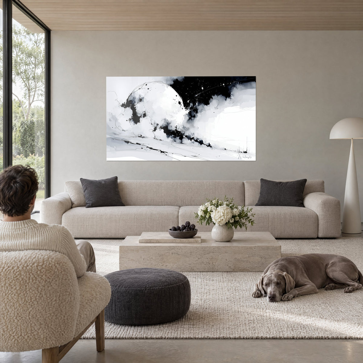 Wall art white moon splashed with black ink, starry sky, masts in the distance, above a sofa in a bright living room
