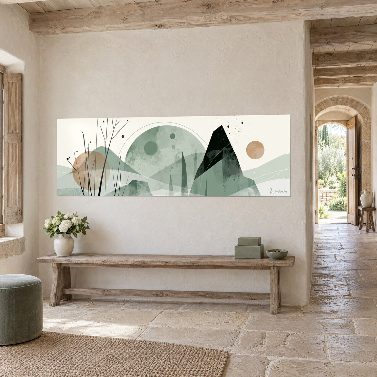 Wall art sage green abstract landscape, sharp black peak, ochre disc and thorny stems, three-quarter view in a stone country house