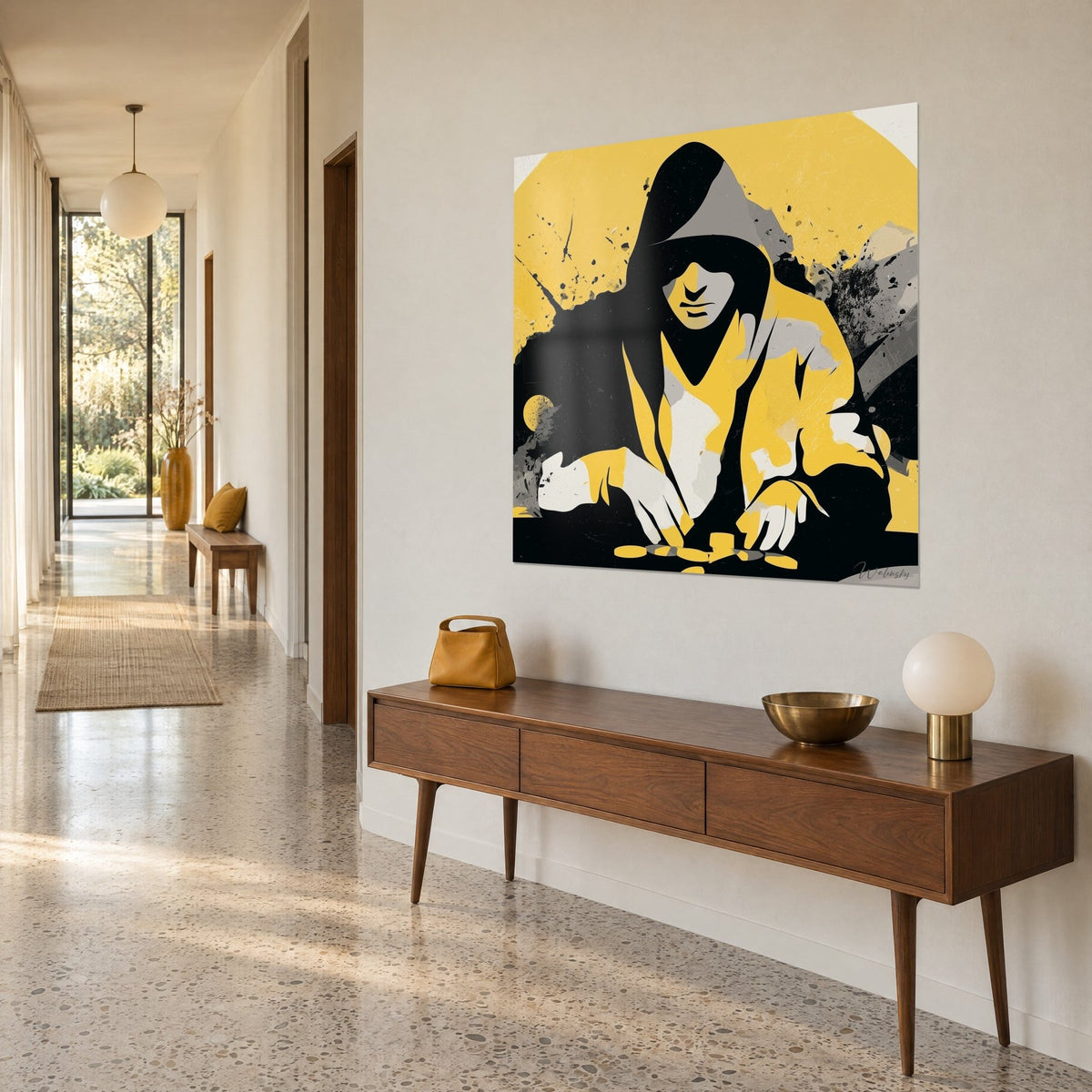 Wall art of a hooded black silhouette leaning over chips, lemon yellow background with grey splatters, in a hallway with terrazzo floor