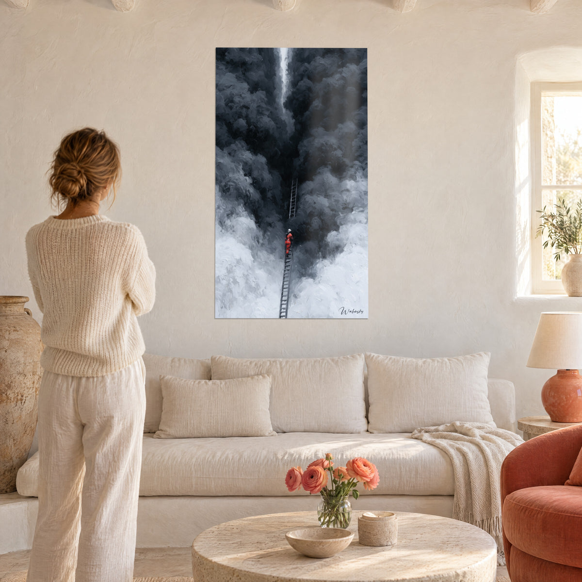 Tableau pompier en combinaison rouge grimpant une échelle grise dans un nuage noir, femme de dos, au-dessus d'un canapé dans un salon lumineux