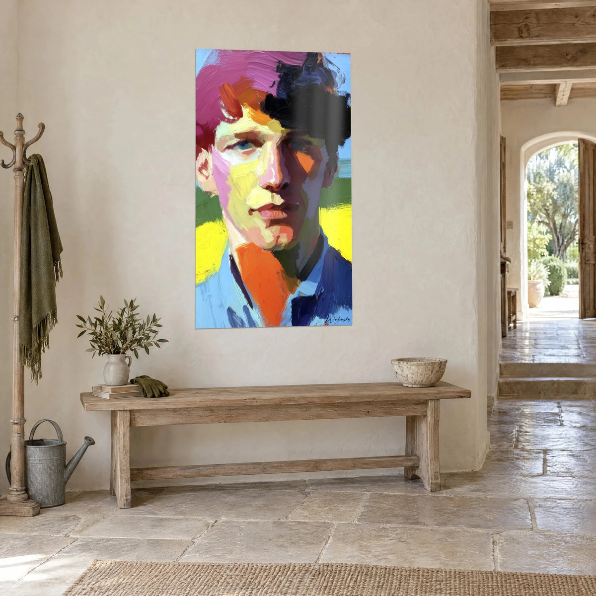 Tableau visage d'homme aux coups de pinceau épais, chevelure rose et noire, fond vert, sur un mur crépi d'une maison en pierre