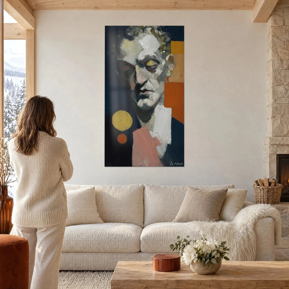 Wall art plaster face with fragmented planes, midnight blue and white, yellow disc, above a sofa in a bright living room