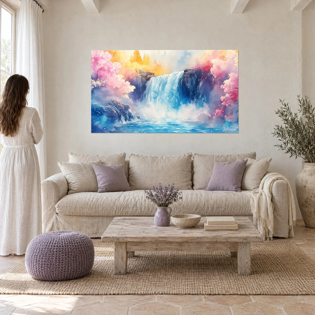 Wall art turquoise waterfall lined with pink cherry trees, saffron yellow sky, woman seen from behind, above a sofa in a bright living room