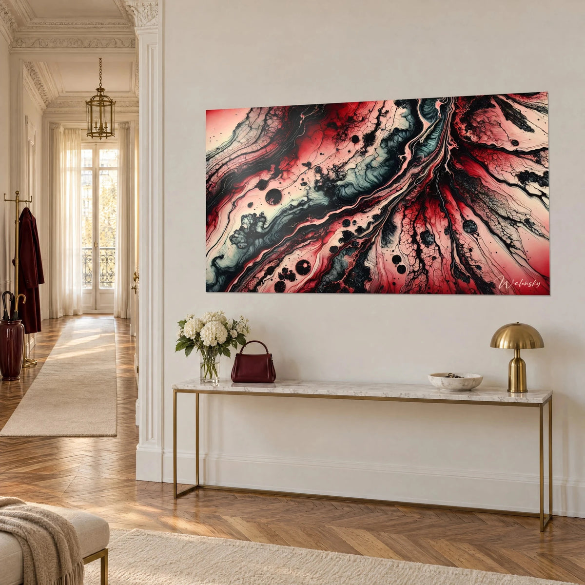 Wall art in fluid art with black cells on pale pink and vivid red, fan-shaped cracks, above a gilded console in a Haussmann-style hallway