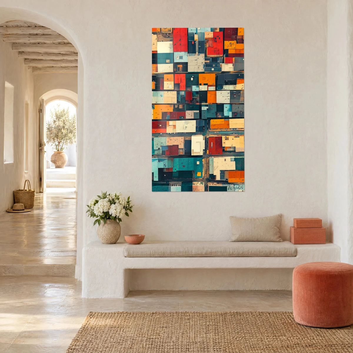 Wall art of a mosaic of facades in flat ochre yellow and petrol blue, hung in a vaulted niche, Mediterranean house