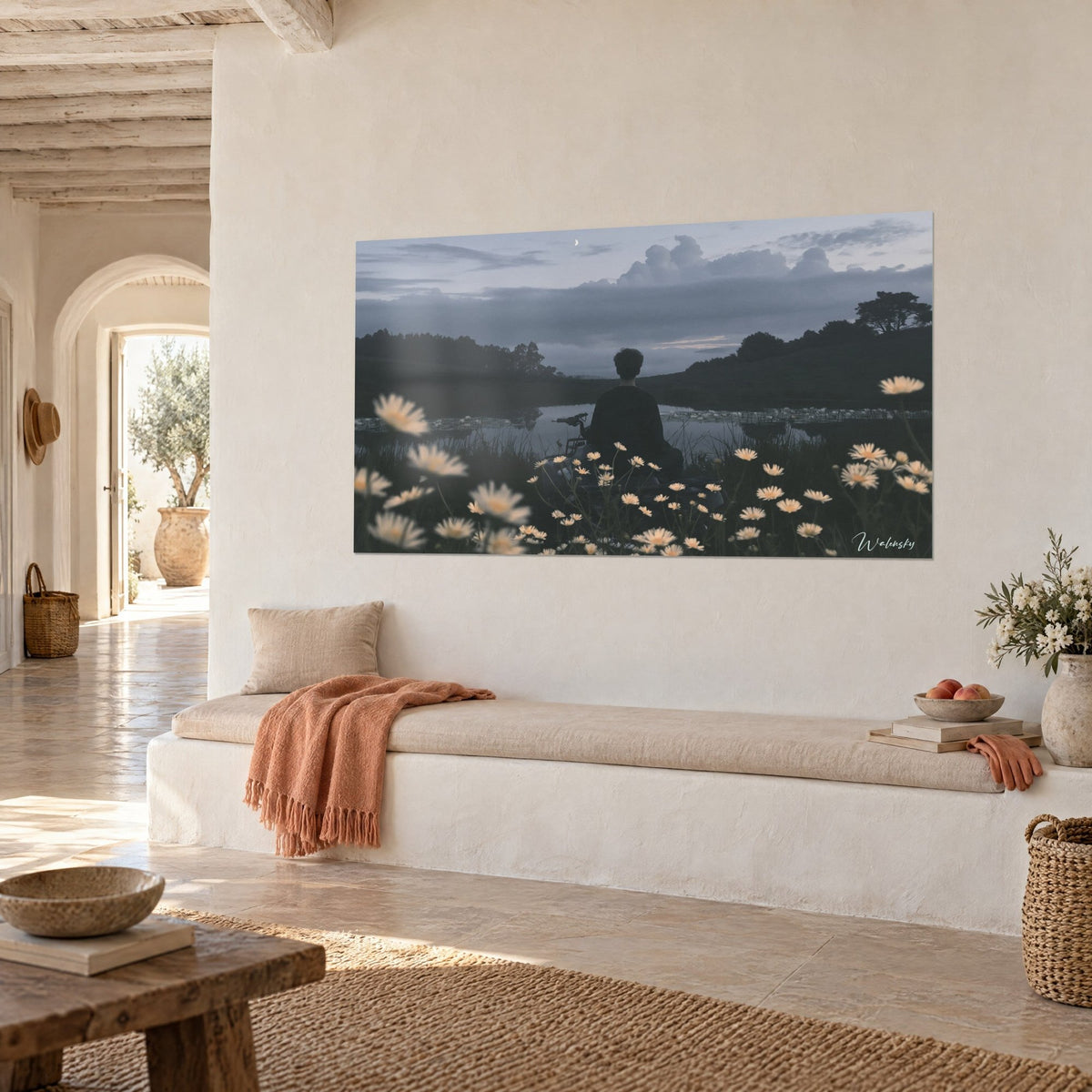 Wall art motionless rider facing the pond, mauve sky and dark green hills, hung at an angle above a bench seat