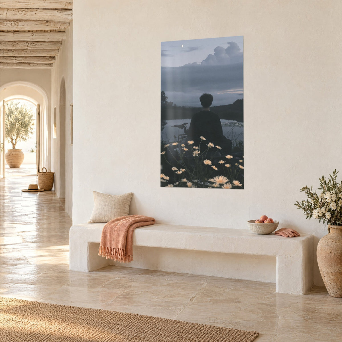 Wall art dark silhouette seated facing the lake at dusk, slate-blue clouds and white flowers, whitewashed wall of an arched corridor