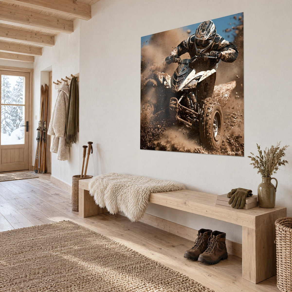 Wall art motocross rider in black gear on a cream vehicle, spurts of brown earth, blue sky, on a chalet wall