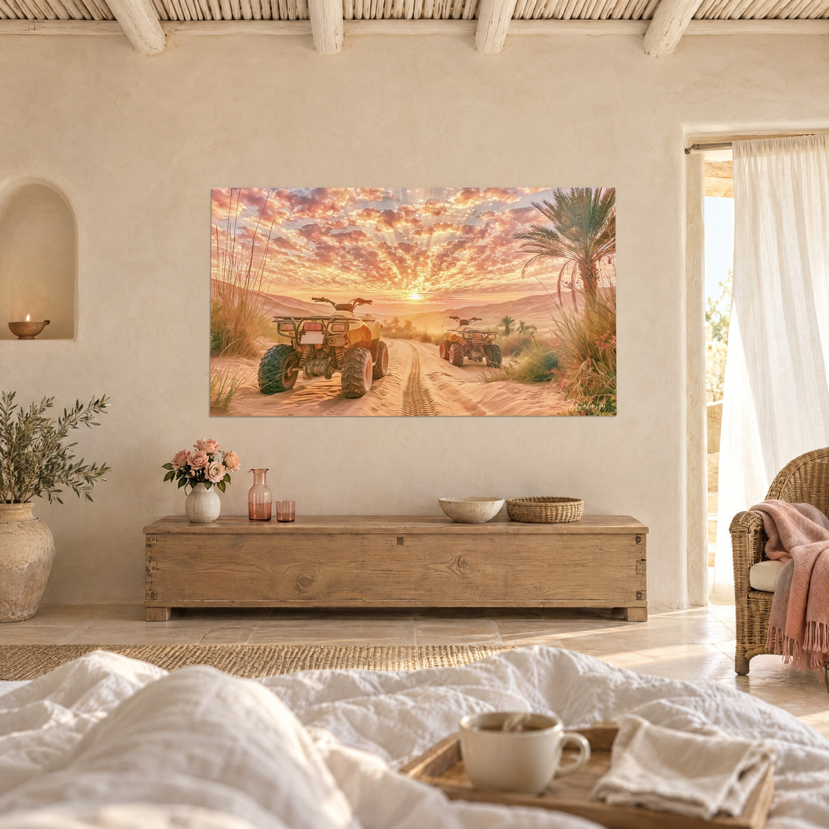 Wall art four-wheeled vehicles on a pink dune, sky of orange and pink cumulus clouds, distant palm trees, above a bed in a light bedroom
