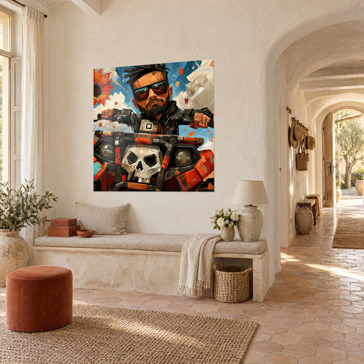 Wall art of a quad rider with a dark beard behind an ivory skull snout, black and bright orange, in an arched hallway of the farmhouse