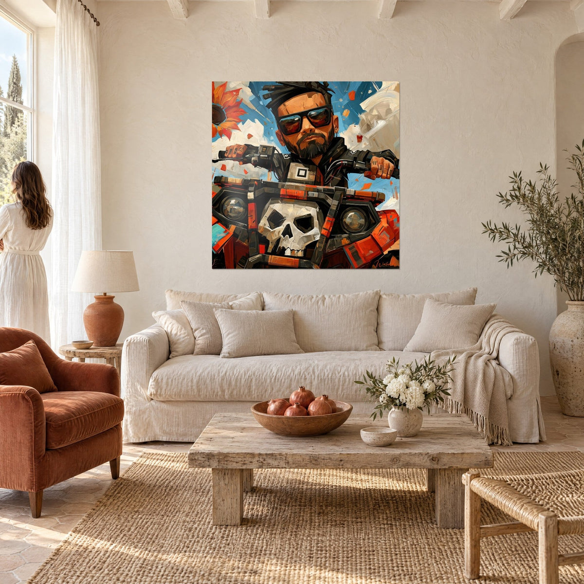 Wall art of a bearded biker in black sunglasses, white skull on an orange handlebar, blue sky, above a sofa in a bright living room