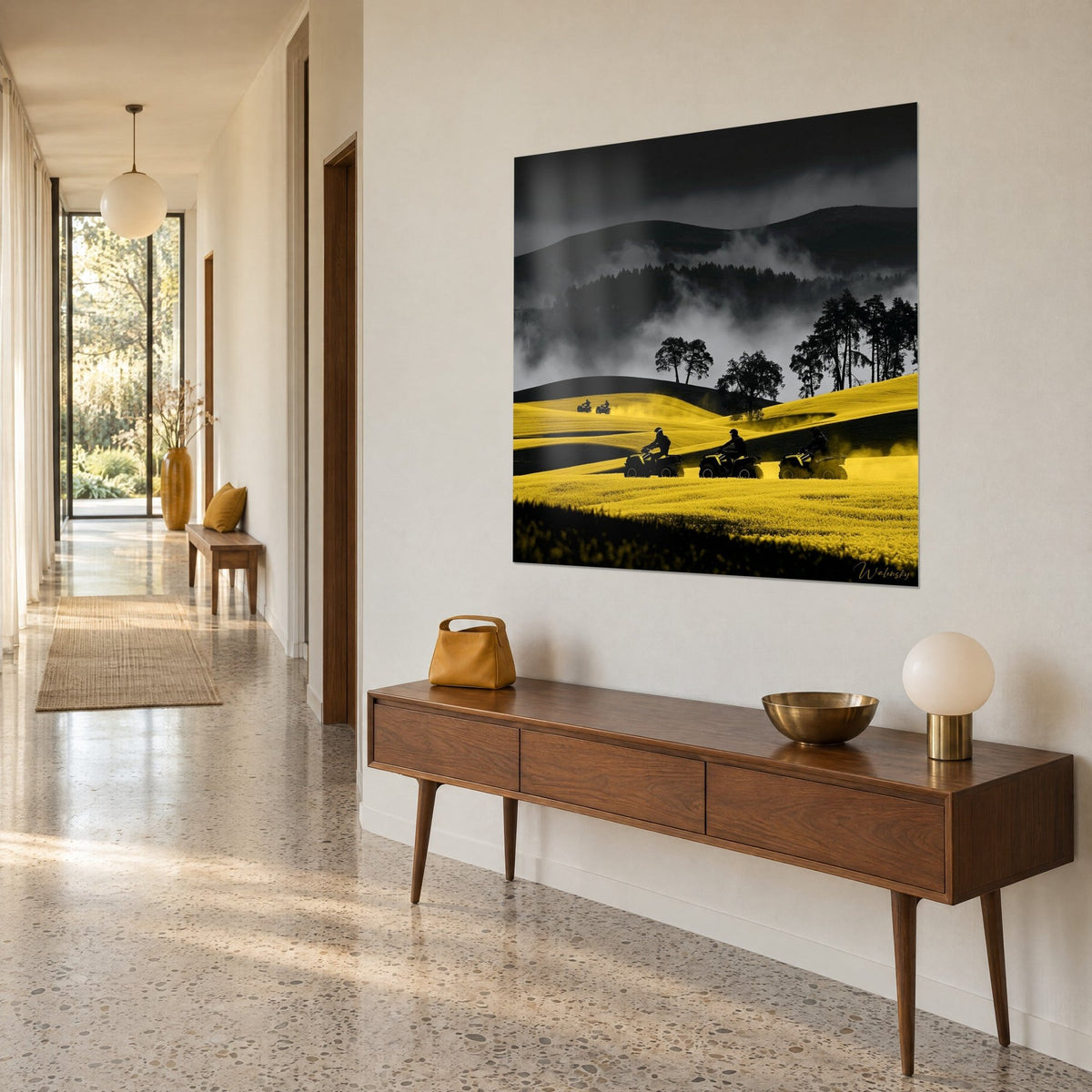 Wall art helmeted riders in silhouette on a golden rapeseed field, dark pines and charcoal clouds, three-quarter view in a hallway