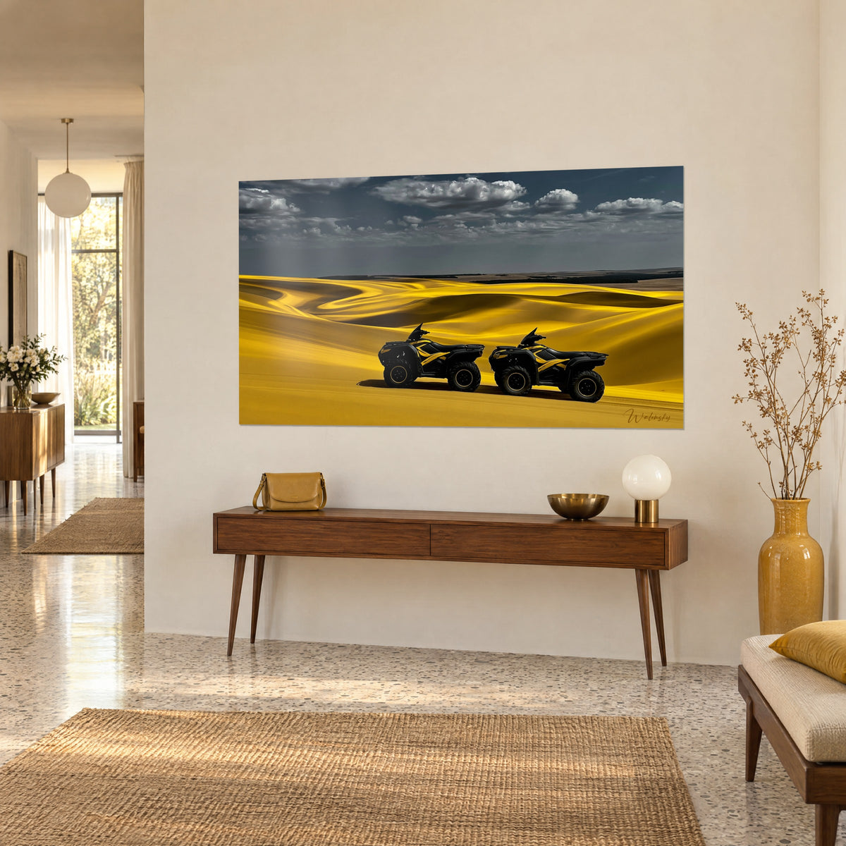 Wall art dark off-road vehicles racing over ochre sand hills, white clouds against a midnight-blue sky, three-quarter view