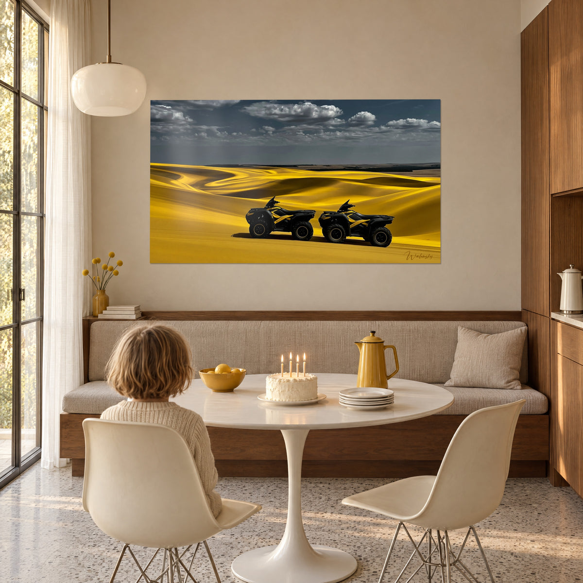Wall art duo of black four-wheel buggies striped with yellow in a saffron desert, cloud-filled sky, wood-panelled dining room