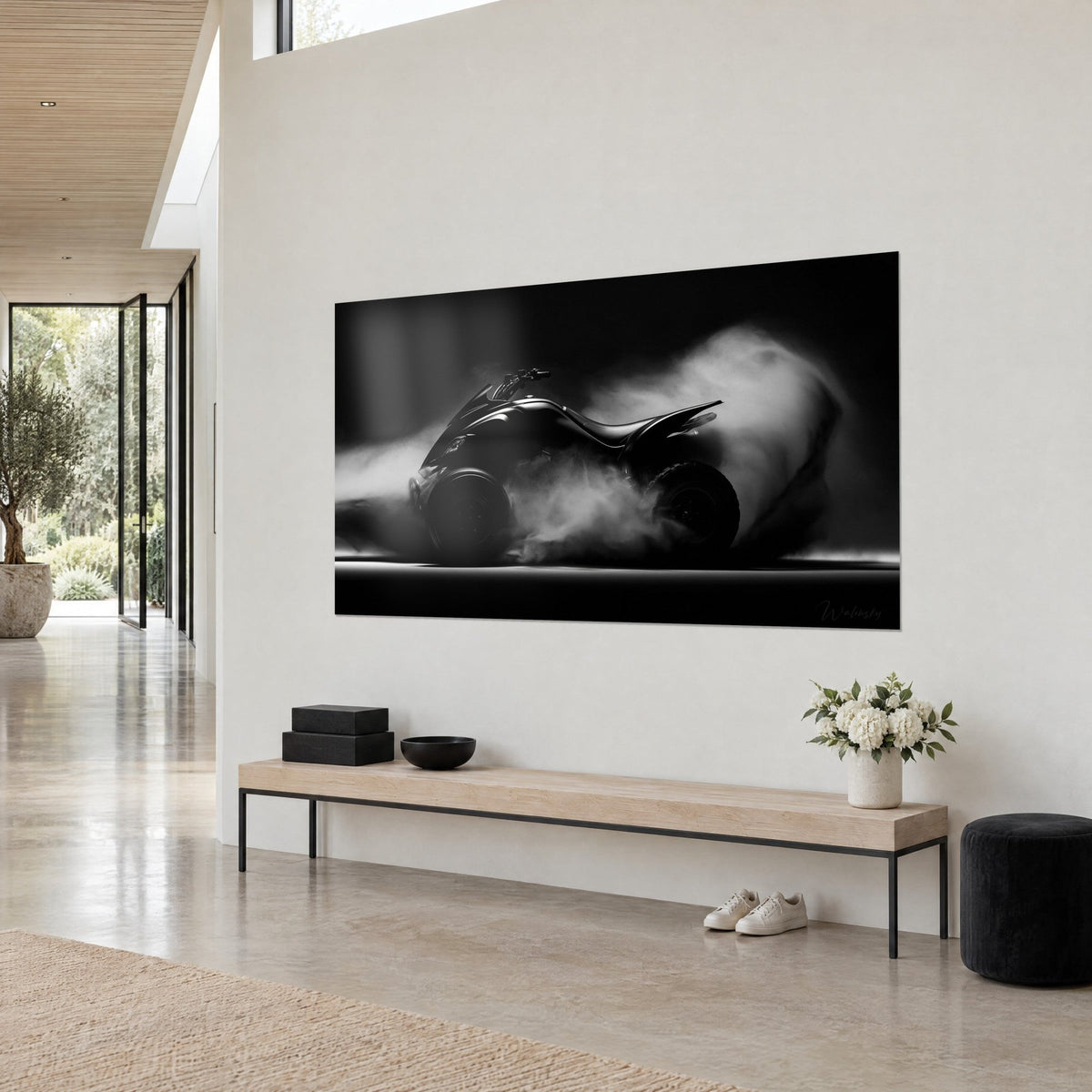 Wall art ebony off-road vehicle with chrome handlebars, grey wisps of smoke on black background, cream wall and light wood bench