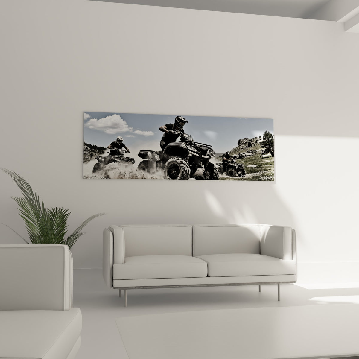 Quad noir en pleine action sur terrain rocailleux, disposé au-dessus d'un canapé dans un salon lumineux