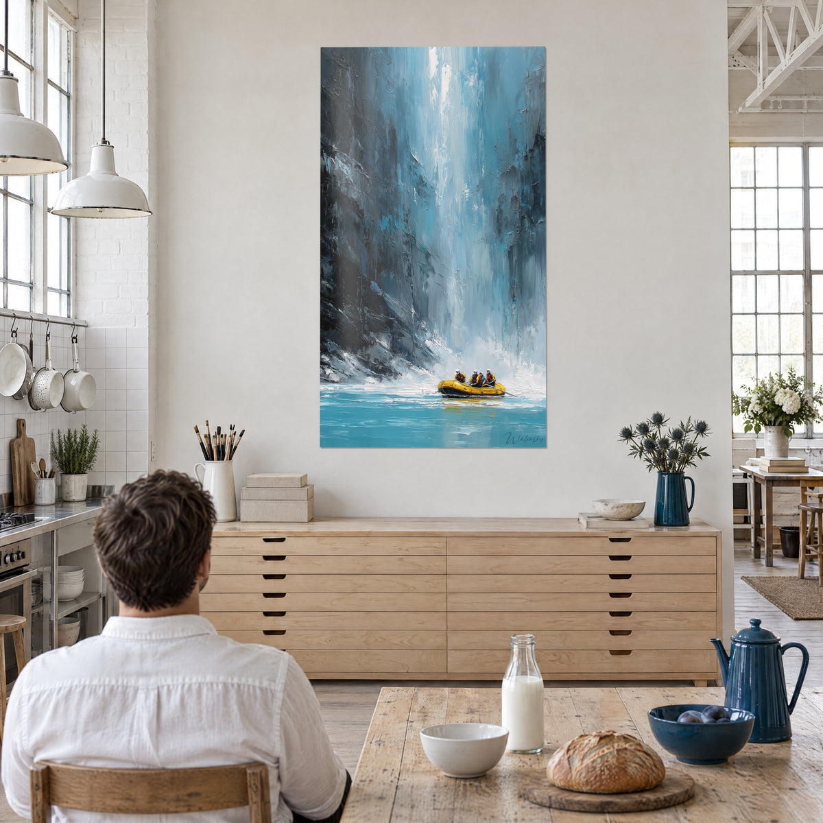 Cuadro aventura en balsa amarilla frente a una inmensa cascada azul acero, acantilado oscuro como un cuchillo, frente a una mesa de madera