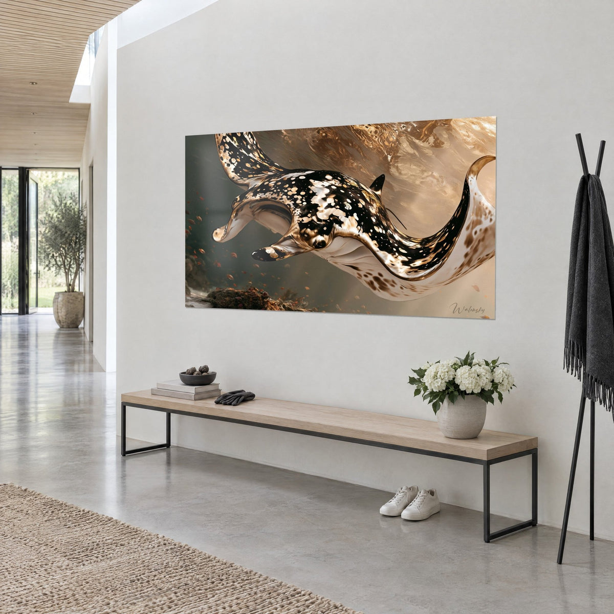 Wall art large black and cream spotted stingray gliding through golden water, small russet fish, on a white wall of an architect-designed house