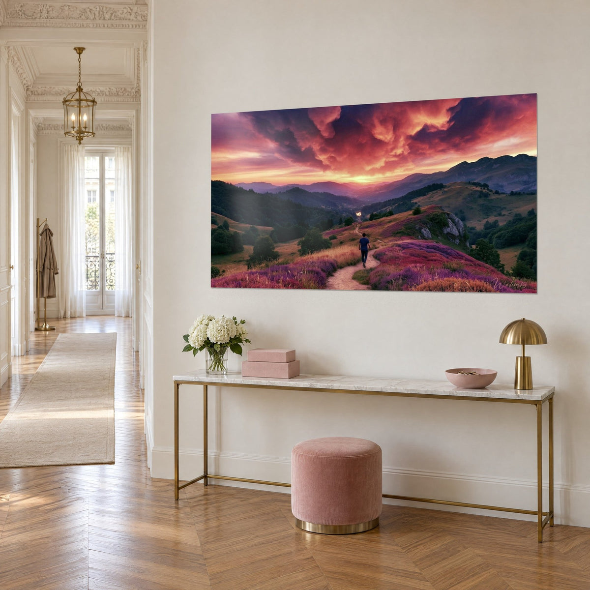Wall art pink and purple heather moorland under glowing red and orange clouds, hung above a gilded Haussmann-style console table