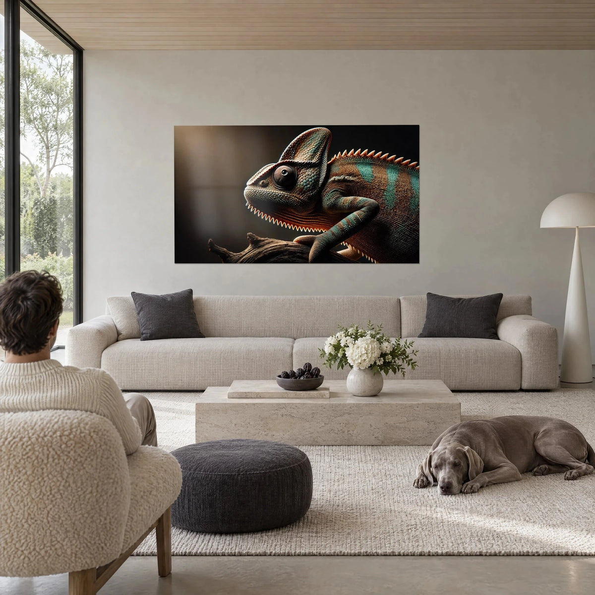Wall art of a chameleon with obsidian eyes, copper scales and turquoise bands, above a sofa in a bright living room