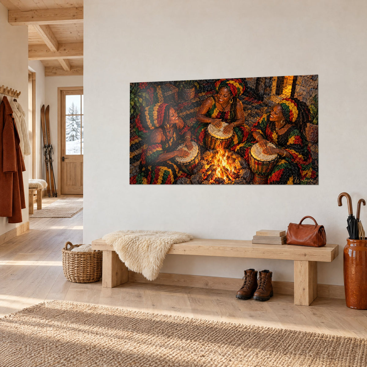 Tableau veillée tribale aux flammes orangées, tresses rouges, vertes et jaunes, posé sur un mur blanc d'entrée en chalet